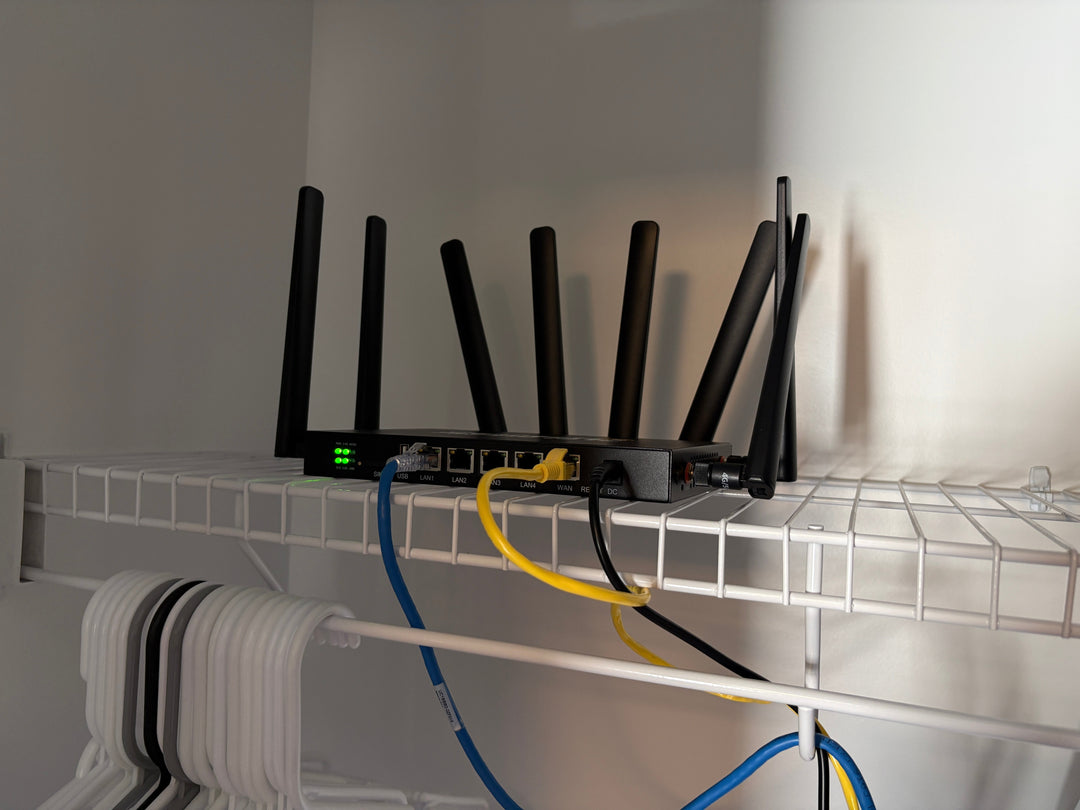 ConnecTen business router wired into a closet network shelf for always-on backup